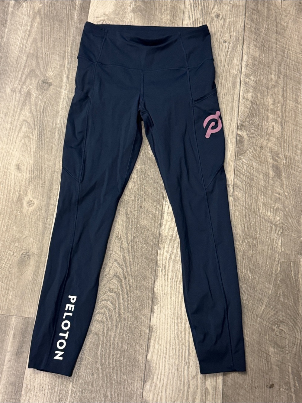 Peloton Navy Leggings with Pink Logo and White Branding